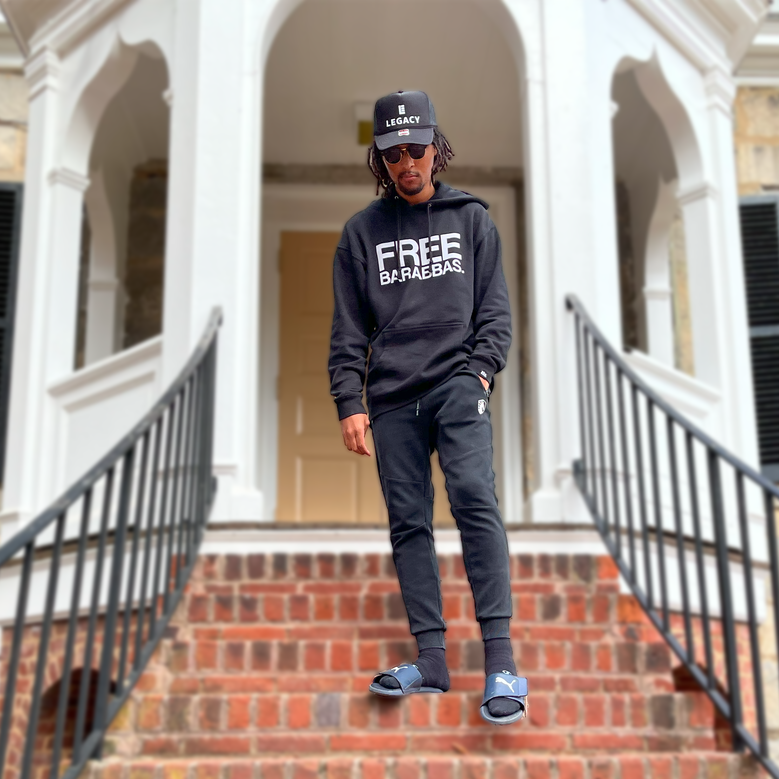 Kral Benji walking down steps